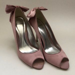 Pink bow tie peep toe stilettos